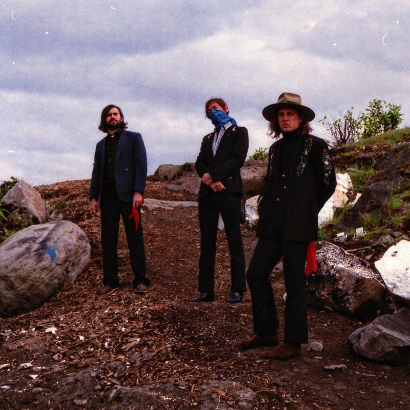 Silver Triplets of the Rio Hondo band image